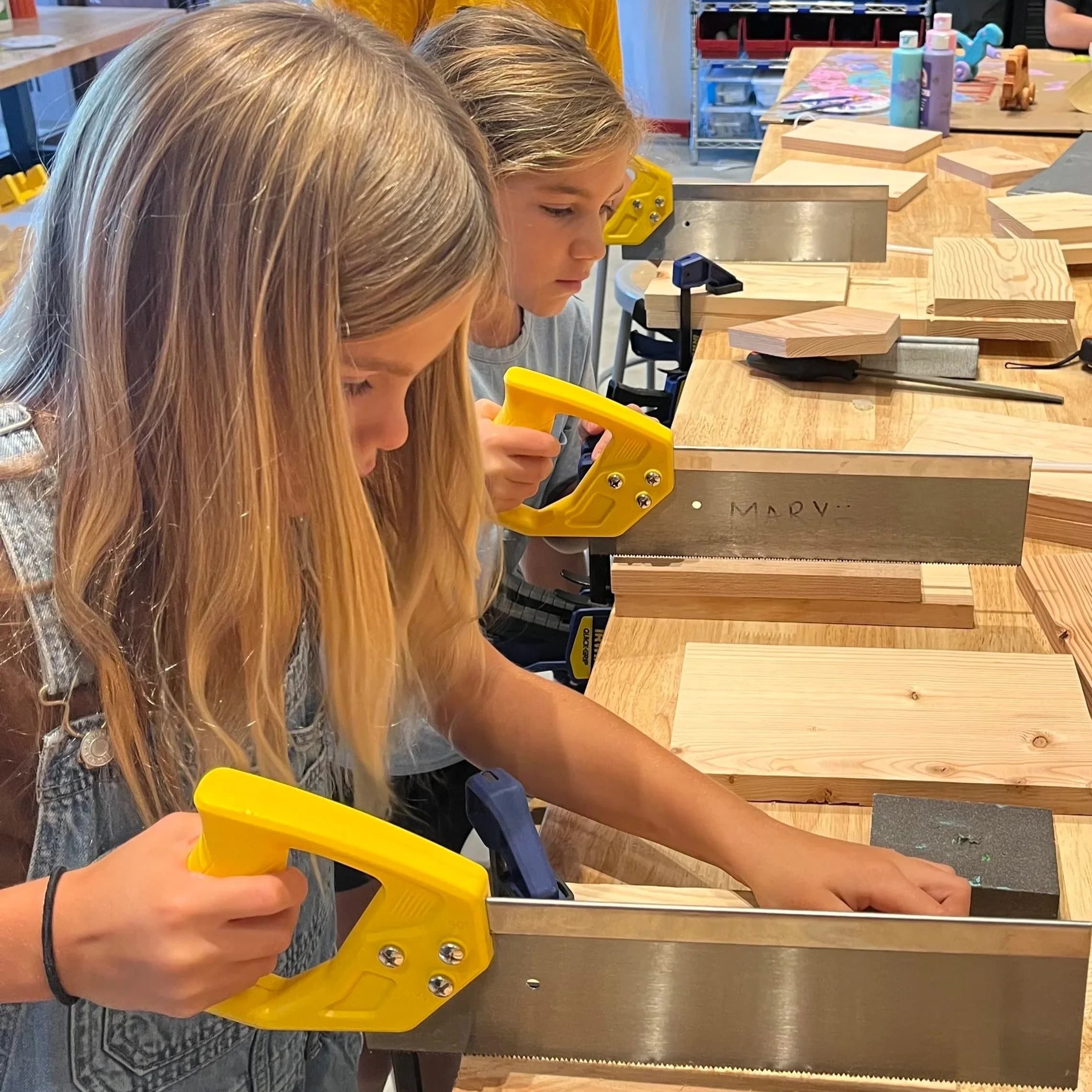 Students working on a day-camp project at Forge Makerspace.