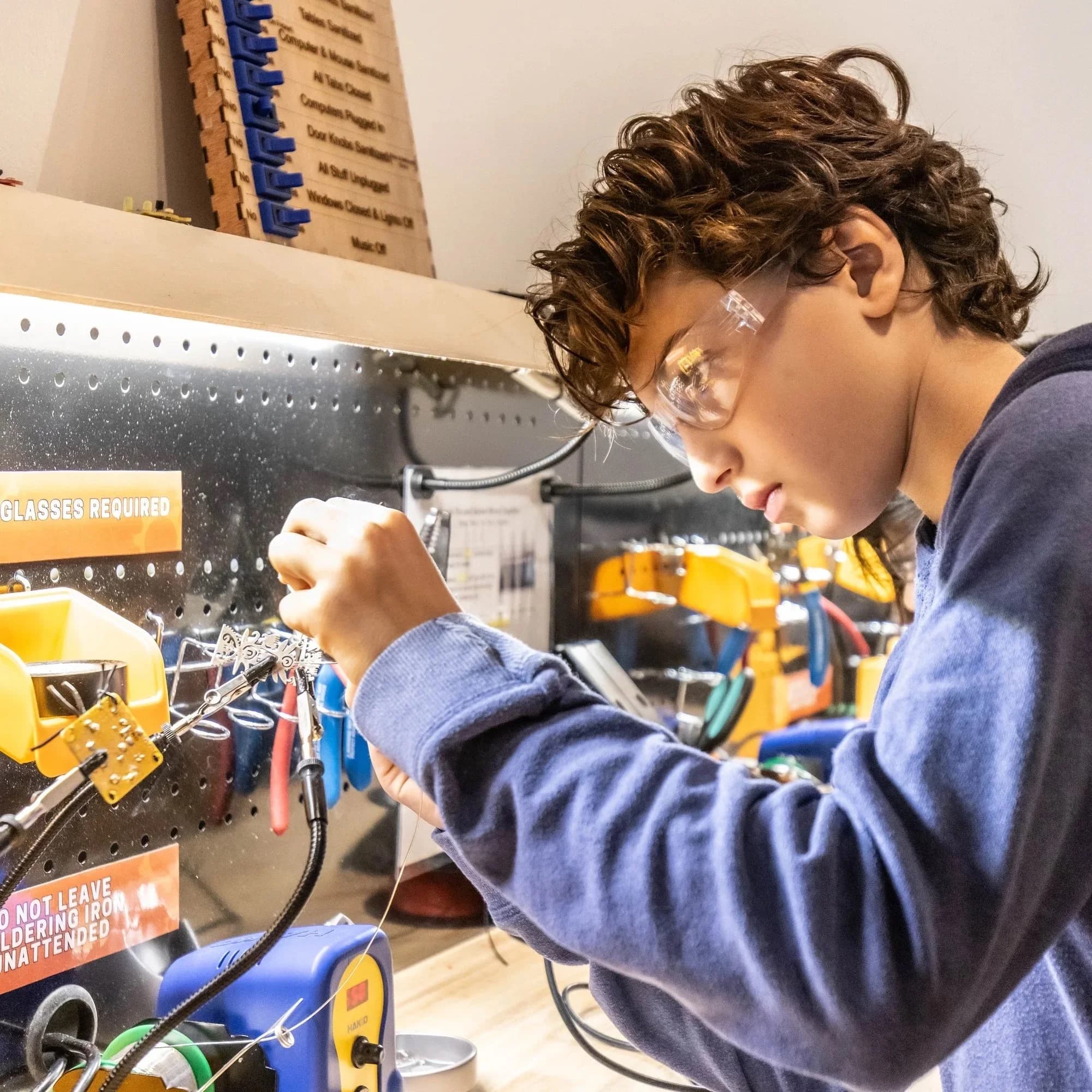 Forge students at summer camp building hands-on engineering projects.